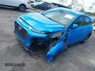 2021 Hyundai Kona SE with VIN KM8K12AA7MU638068, listed as a IAAI auction lot 42012280 with 67,637 mi miles and . Bid and sale history available at DreamBid. Image 2.