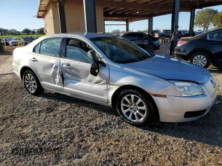 2006 Mercury Milan with VIN 3MEHM07126R655886, listed as a Copart auction lot 82015354 with 128,341 mi miles and Salvage title. Bid and sale history available at DreamBid. Image 4.