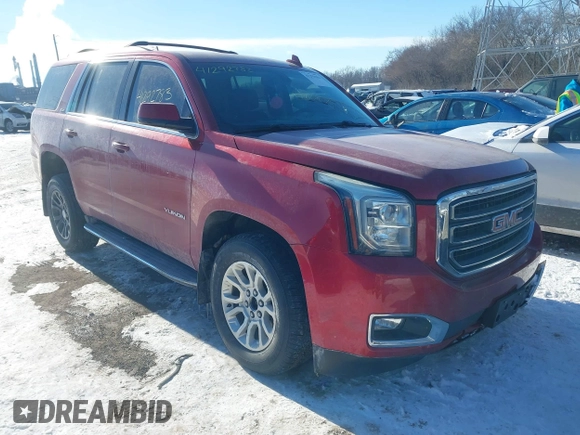 2015 GMC Yukon SLE with VIN 1GKS2AKC2FR514005, listed as a IAAI auction lot 41292783 with 129,413 mi miles. Bid and sale history available at carsss.com. Image 1.
