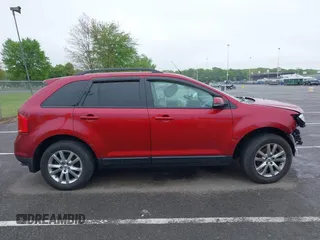 2014 Ford Edge SEL z VIN 2FMDK4JC2EBB09752, wystawiony jako IAAI lot #42180224 z przebiegiem 107 503 mil mil oraz . Historia ofert i sprzedaży dostępna na DreamBid. Obrazek 13.