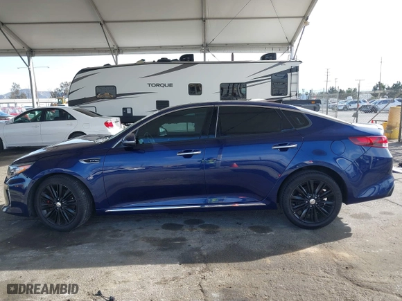 2018 Kia Optima SX with VIN 5XXGV4L29JG208284, listed as a IAAI auction lot 41765005 with 77,189 mi miles. Bid and sale history available at carsss.com. Image 15.