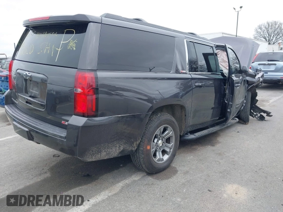 2017 Chevrolet Suburban LT z VIN 1GNSKHKC2HR315082, wystawiony jako IAAI lot #41545420 z przebiegiem 117 565 mil mil oraz . Historia ofert i sprzedaży dostępna na DreamBid. Obrazek 4.