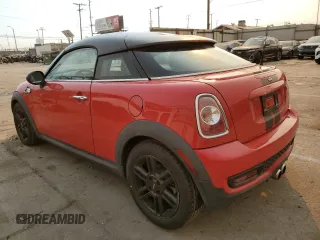 2012 MINI Coupe S z VIN WMWSX3C57CT155013, wystawiony jako Copart lot #88066275 z przebiegiem 69 870 mil mil oraz Szkody całkowita. Historia ofert i sprzedaży dostępna na DreamBid. Obrazek 2.