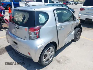 2012 Scion iQ with VIN JTNJJXB07CJ018562, listed as a IAAI auction lot 42404672 with 79,867 mi miles and . Bid and sale history available at DreamBid. Image 4.