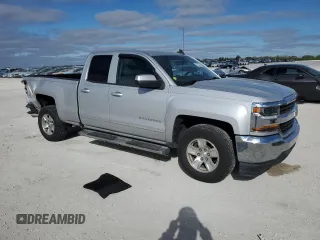2018 Chevrolet Silverado 1500 LT with VIN 1GCRCREH4JZ159330, listed as a Copart auction lot 87587095 with 173,986 mi miles and Salvage Title. Bid and sale history available at DreamBid. Image 4.