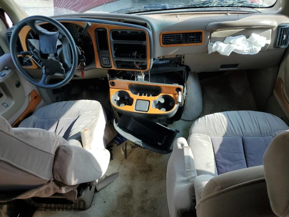 1997 Chevrolet Express Cargo z VIN 1GBFG15R6V1001646, wystawiony jako Copart lot #58242705 z przebiegiem 197 190 mil mil oraz Szkoda całkowita • Salvage title. Historia ofert i sprzedaży dostępna na DreamBid. Obrazek 8.