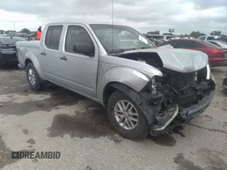 2015 Nissan Frontier SV z VIN 1N6AD0ERXFN740373, wystawiony jako IAAI lot #42191372 z przebiegiem 121 704 mil mil oraz . Historia ofert i sprzedaży dostępna na DreamBid. Obrazek 1.