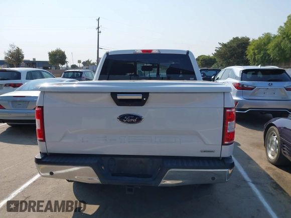 2019 Ford F-150 XL with VIN 1FTEW1C44KKC60773, listed as a IAAI auction lot 42706042 with 185,864 mi miles and . Bid and sale history available at DreamBid. Image 17.