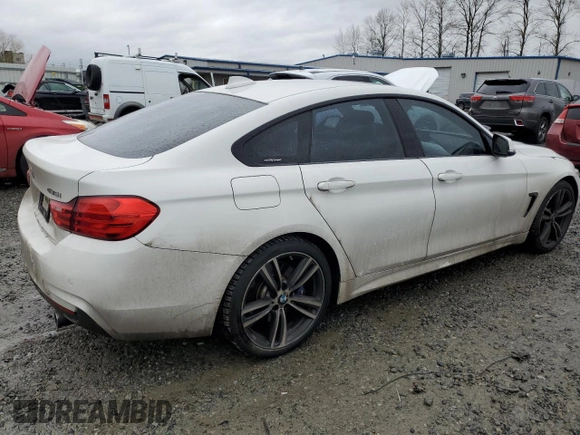 2015 BMW 4 Series 435i xDrive with VIN WBA4B3C56FD669599, listed as a Copart auction lot 43461545 with 186,082 mi miles and Salvage title. Bid and sale history available at DreamBid. Image 3.
