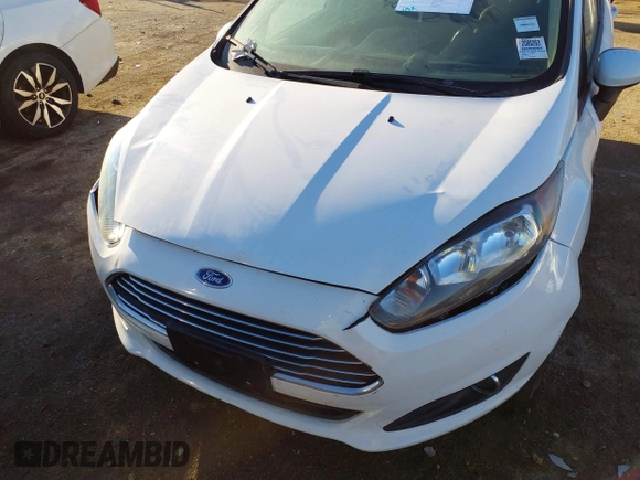 2019 Ford Fiesta SE z VIN 3FADP4EJ0KM148306, wystawiony jako IAAI lot #41666170 z przebiegiem 68 966 mil mil oraz . Historia ofert i sprzedaży dostępna na DreamBid. Obrazek 6.
