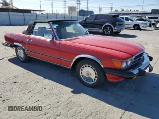 1989 Mercedes-Benz 560 SL with VIN WDBBA48D7KA103478, listed as a Copart auction lot 46119905 with 149,105 mi miles and Salvage Title. Bid and sale history available at DreamBid. Image 4.