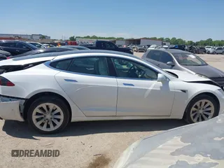2017 Tesla Model S 100D with VIN 5YJSA1E20HF232570, listed as a IAAI auction lot 42037409 with 68,957 mi miles and . Bid and sale history available at DreamBid. Image 13.