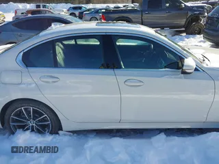 2021 BMW 3 Series 330i xDrive z VIN 3MW5R7J06M8C14597, wystawiony jako IAAI lot #41581041 z przebiegiem 8776 mil mil oraz . Historia ofert i sprzedaży dostępna na DreamBid. Obrazek 13.