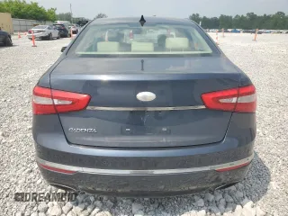 2014 Kia Cadenza Premium z VIN KNALN4D70E5167401, wystawiony jako Copart lot #59879075 z przebiegiem 130 894 mil mil oraz Czysty tytuł • Clean title. Historia ofert i sprzedaży dostępna na DreamBid. Obrazek 6.