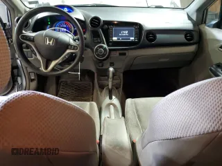 2010 Honda Insight EX with VIN JHMZE2H76AS021610, listed as a Copart auction lot 62992225 with 162,974 mi miles and Salvage title. Bid and sale history available at DreamBid. Image 8.