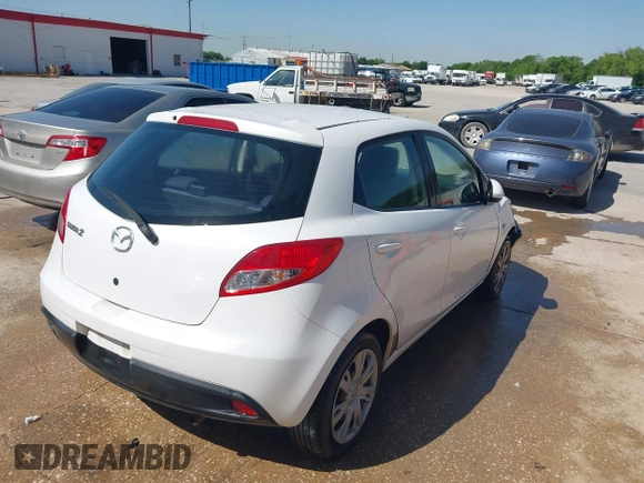 2012 Mazda Mazda2 Sport with VIN JM1DE1KY7C0140773, listed as a IAAI auction lot 41956594 with 188,924 mi miles. Bid and sale history available at carsss.com. Image 4.