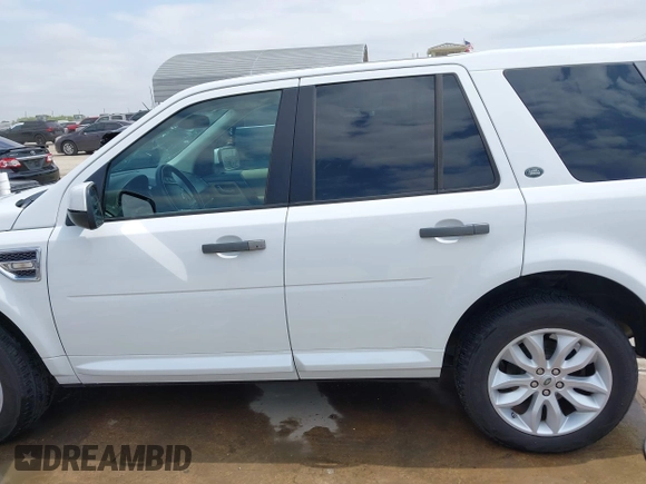 2012 Land Rover LR2 HSE with VIN SALFR2BN1CH296035, listed as a IAAI auction lot 42032525 with 158,677 mi miles and . Bid and sale history available at DreamBid. Image 14.