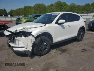 2021 Mazda CX-5 Touring with VIN JM3KFBCM7M0386995, listed as a Copart auction lot 55255784 with 43,561 mi miles and Salvage Title. Bid and sale history available at carsss.com. Image 1.