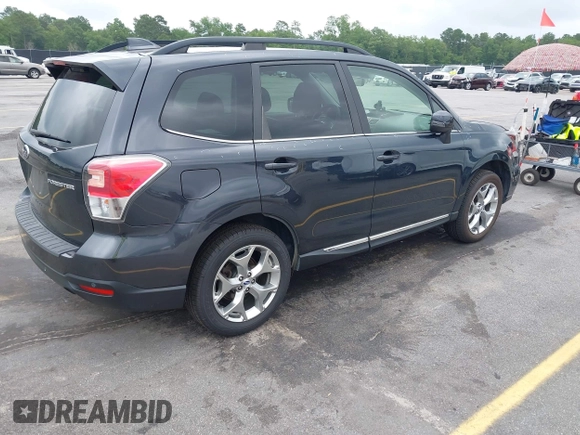2018 Subaru Forester Touring with VIN JF2SJAWC2JH492788, listed as a IAAI auction lot 42358591 with 83,354 mi miles and . Bid and sale history available at DreamBid. Image 4.