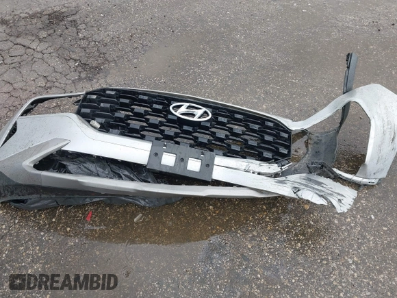 2023 Hyundai Santa Fe SE with VIN 5NMS14AJ5PH626769, listed as a IAAI auction lot 42637931 with 10,712 mi miles and . Bid and sale history available at DreamBid. Image 12.