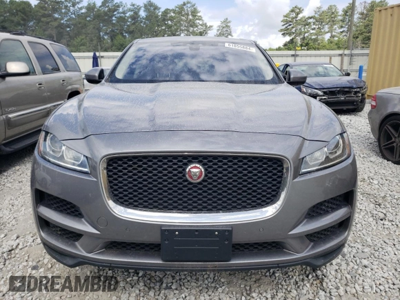 2020 Jaguar F-Pace 25t Premium z VIN SADCJ2FX2LA622614, wystawiony jako Copart lot #61855884 z przebiegiem 116 046 mil mil oraz Szkody całkowita. Historia ofert i sprzedaży dostępna na DreamBid. Obrazek 5.