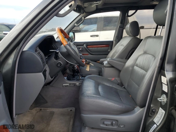 2001 Lexus LX 470 with VIN JTJHT00W313509544, listed as a Copart auction lot 69942924 with 174,635 mi miles and Clean Title. Bid and sale history available at carsss.com. Image 7.