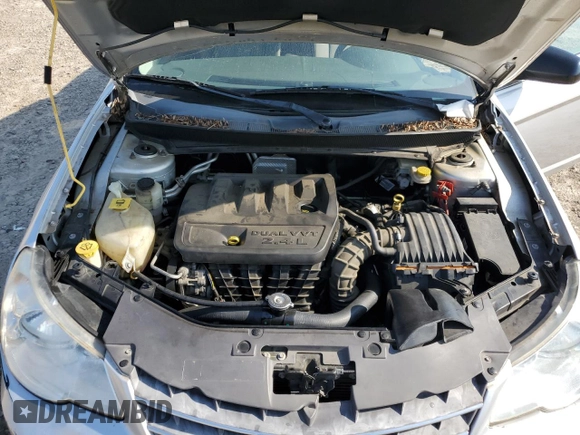 2008 Chrysler Sebring LX z VIN 1C3LC45K28N188707, wystawiony jako Copart lot #60137105 z przebiegiem 245 175 mil mil oraz Szkoda całkowita • Salvage title. Historia ofert i sprzedaży dostępna na DreamBid. Obrazek 11.