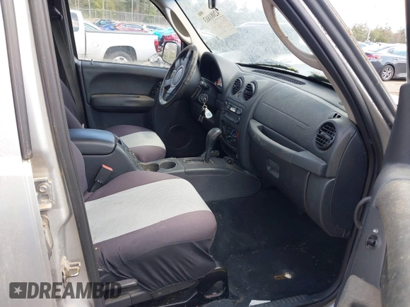 2004 Jeep Liberty Sport with VIN 1J4GL48K64W191486, listed as a IAAI auction lot 42081883 with 179,964 mi miles. Bid and sale history available at carsss.com. Image 5.