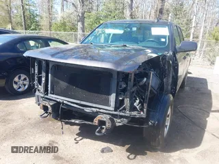 2015 Chevrolet Silverado 1500 LT with VIN 1GCVKREH4FZ256729, listed as a IAAI auction lot 41973711 with 185,791 mi miles. Bid and sale history available at carsss.com. Image 6.