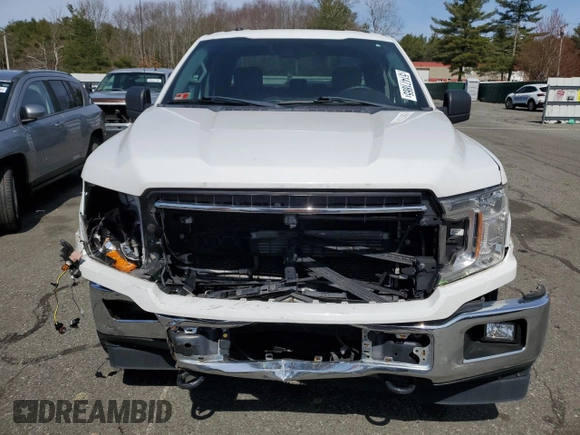 2018 Ford F-150 XL with VIN 1FTEX1EB8JFC67368, listed as a Copart auction lot 51471865 with 63,622 mi miles and Salvage Title. Bid and sale history available at DreamBid. Image 5.