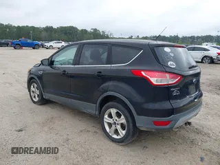 2016 Ford Escape SE with VIN 1FMCU9G99GUC13053, listed as a IAAI auction lot 41888535 with 84,019 mi miles. Bid and sale history available at carsss.com. Image 3.