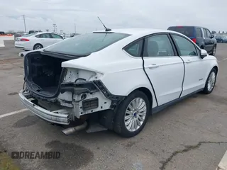 2015 Ford Fusion S Hybrid with VIN 3FA6P0UU2FR283244, listed as a IAAI auction lot 41740108 with 141,739 mi miles. Bid and sale history available at carsss.com. Image 4.