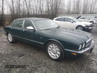 2000 Jaguar XJ with VIN SAJDA25BXYMF01667, listed as a Copart auction lot 41333495 with 102,291 mi miles and Clean Title. Bid and sale history available at DreamBid. Image 4.