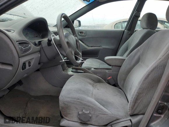 2003 Mitsubishi Galant ES z VIN 4A3AA46G03E180873, wystawiony jako Copart lot #46141195 z przebiegiem 234 709 mil mil oraz Szkoda całkowita • Salvage title. Historia ofert i sprzedaży dostępna na DreamBid. Obrazek 7.