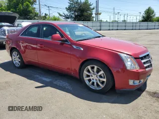 2009 Cadillac CTS AWD z VIN 1G6DG577790165752, wystawiony jako Copart lot #56229725 z przebiegiem 152 488 mil mil oraz Czysty tytuł • Clean title. Historia ofert i sprzedaży dostępna na DreamBid. Obrazek 4.