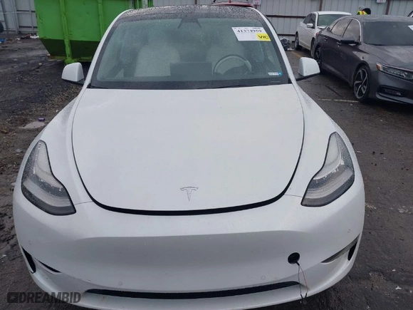 2020 Tesla Model Y Long Range with VIN 5YJYGDEEXLF020059, listed as a IAAI auction lot 41374959 with NaN miles. Bid and sale history available at carsss.com. Image 12.