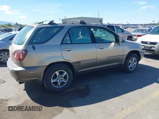 1999 Lexus RX 300 with VIN JT6HF10U9X0080216, listed as a IAAI auction lot 42219637 with 248,595 mi miles and . Bid and sale history available at DreamBid. Image 4.
