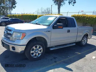 2014 Ford F-150 XL with VIN 1FTEX1CM2EFB01776, listed as a IAAI auction lot 41806274 with 157,704 mi miles. Bid and sale history available at carsss.com. Image 18.
