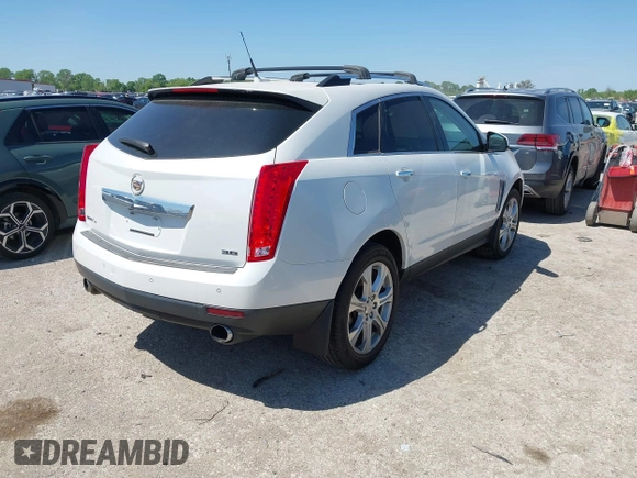 2014 Cadillac SRX Performance Collection with VIN 3GYFNFE35ES582897, listed as a IAAI auction lot 41978361 with 144,116 mi miles and . Bid and sale history available at DreamBid. Image 4.