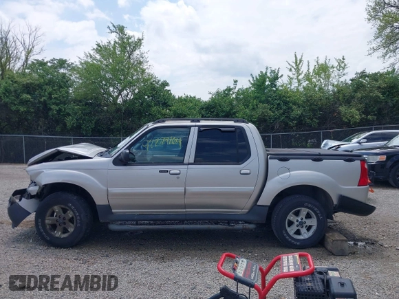 2005 Ford Explorer Sport Trac XLS z VIN 1FMZU77K55UB51889, wystawiony jako IAAI lot #42279164 z przebiegiem 210 081 mil mil oraz . Historia ofert i sprzedaży dostępna na DreamBid. Obrazek 14.