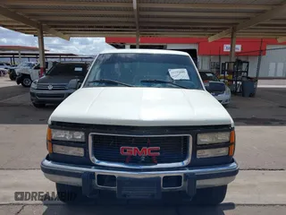 1995 GMC Sierra 1500 z VIN 2GTEK19K9S1591415, wystawiony jako IAAI lot #41793889 z przebiegiem 334 435 mil mil oraz . Historia ofert i sprzedaży dostępna na DreamBid. Obrazek 6.