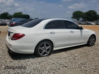 2019 Mercedes-Benz E 300 with VIN WDDZF4JB8KA645219, listed as a Copart auction lot 59702515 with 55,117 mi miles and Salvage title. Bid and sale history available at DreamBid. Image 3.