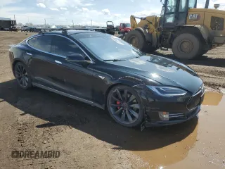 2014 Tesla Model S P85D with VIN 5YJSA1H28EFP63765, listed as a Copart auction lot 50241385 with 100,274 mi miles and Salvage Title. Bid and sale history available at DreamBid. Image 4.