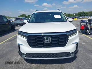 2024 Honda Pilot Touring z VIN 5FNYG2H72RB016937, wystawiony jako IAAI lot #42137854 z przebiegiem 18 028 mil mil oraz . Historia ofert i sprzedaży dostępna na DreamBid. Obrazek 12.