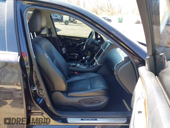 2015 Infiniti Q50 Premium z VIN JN1BV7AR2FM416586, wystawiony jako IAAI lot #41728760 z przebiegiem 138 446 mil mil oraz . Historia ofert i sprzedaży dostępna na DreamBid. Obrazek 5.