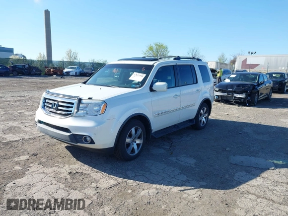 2012 Honda Pilot Touring with VIN 5FNYF4H98CB057659, listed as a IAAI auction lot 41927990 with 140,000 mi miles. Bid and sale history available at carsss.com. Image 17.