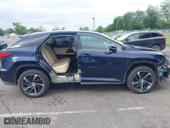 2016 Lexus RX 350 with VIN 2T2BZMCA0GC001767, listed as a IAAI auction lot 42571629 with 84,041 mi miles and . Bid and sale history available at DreamBid. Image 17.