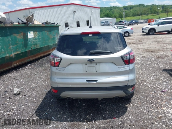 2017 Ford Escape Titanium with VIN 1FMCU0J99HUB23567, listed as a IAAI auction lot 42127795 with 93,056 mi miles. Bid and sale history available at carsss.com. Image 16.