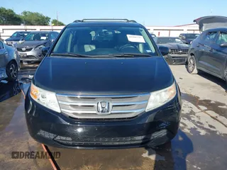 2013 Honda Odyssey EX-L with VIN 5FNRL5H6XDB090768, listed as a IAAI auction lot 42008759 with 116,052 mi miles and . Bid and sale history available at carsss.com. Image 12.