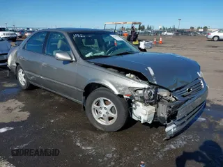 1998 Toyota Camry LE z VIN 4T1BG28KXWU248887, wystawiony jako IAAI lot #41507392 z przebiegiem Nie podano mil oraz . Historia ofert i sprzedaży dostępna na DreamBid. Obrazek 1.